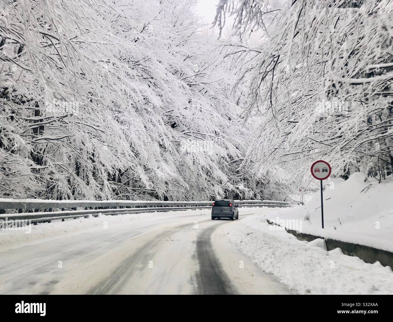 Car on winter road - Smartphone Captured Stock Image
