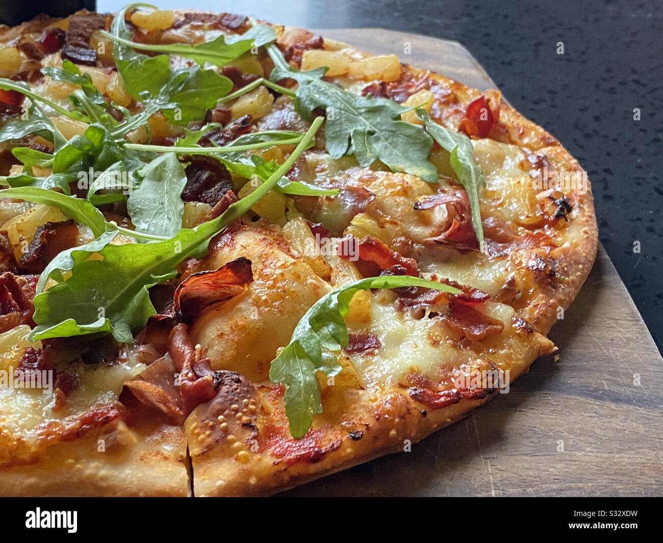 Hawaiian thin crust pizza Stock Photo