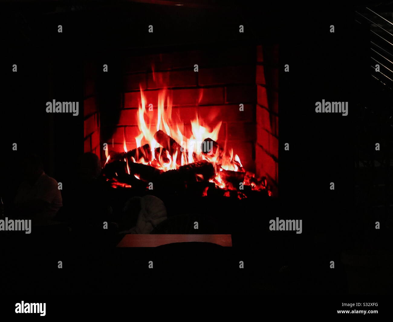 Warm fire Glow..... on TV! - Smartphone Captured Stock Image