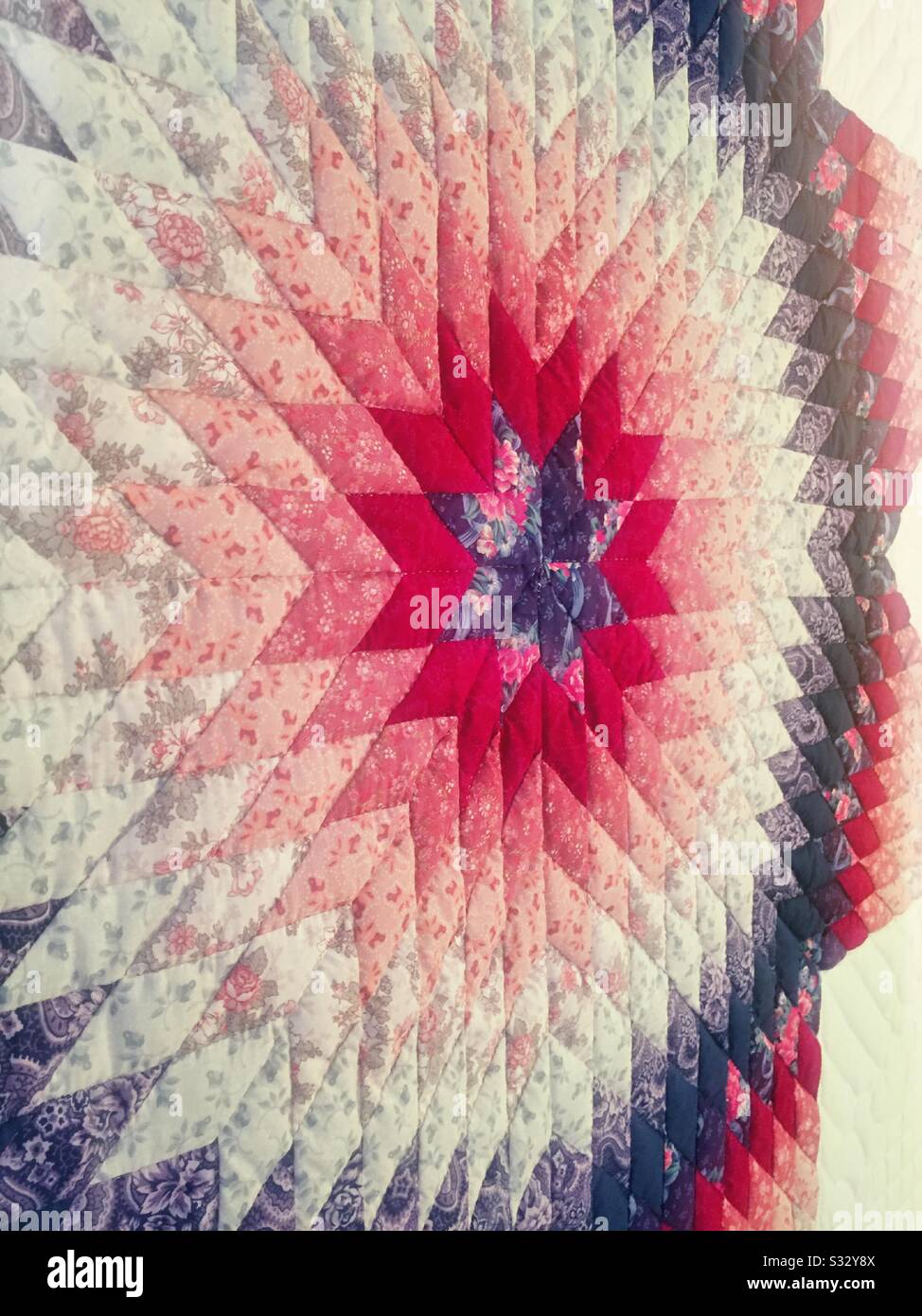 Close up of a hand stitched quilt, USA - Smartphone Captured Stock Image