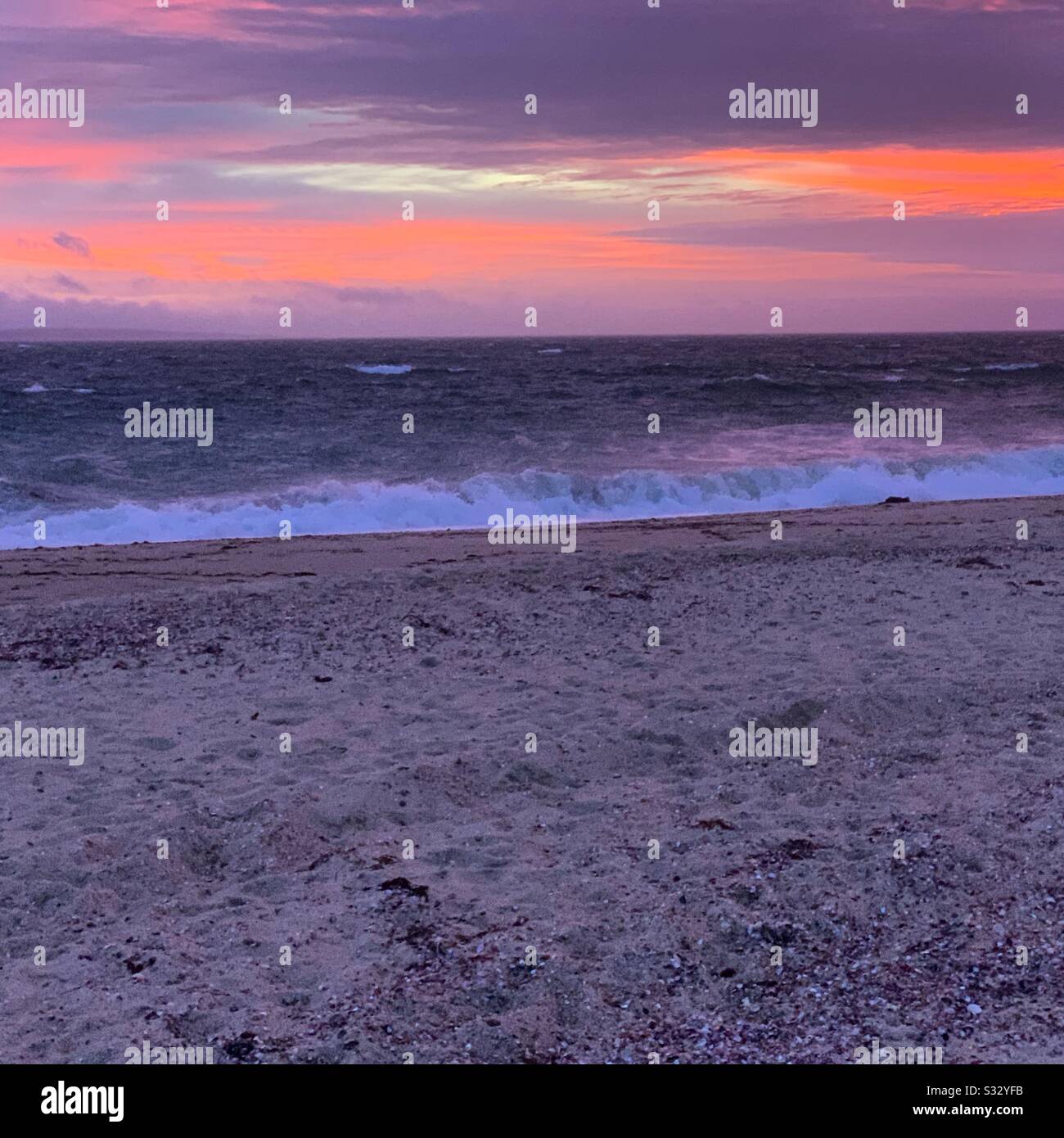Sunset in winter on a beach on Cape Cod, Massachusetts, United States - Smartphone Captured Stock Image