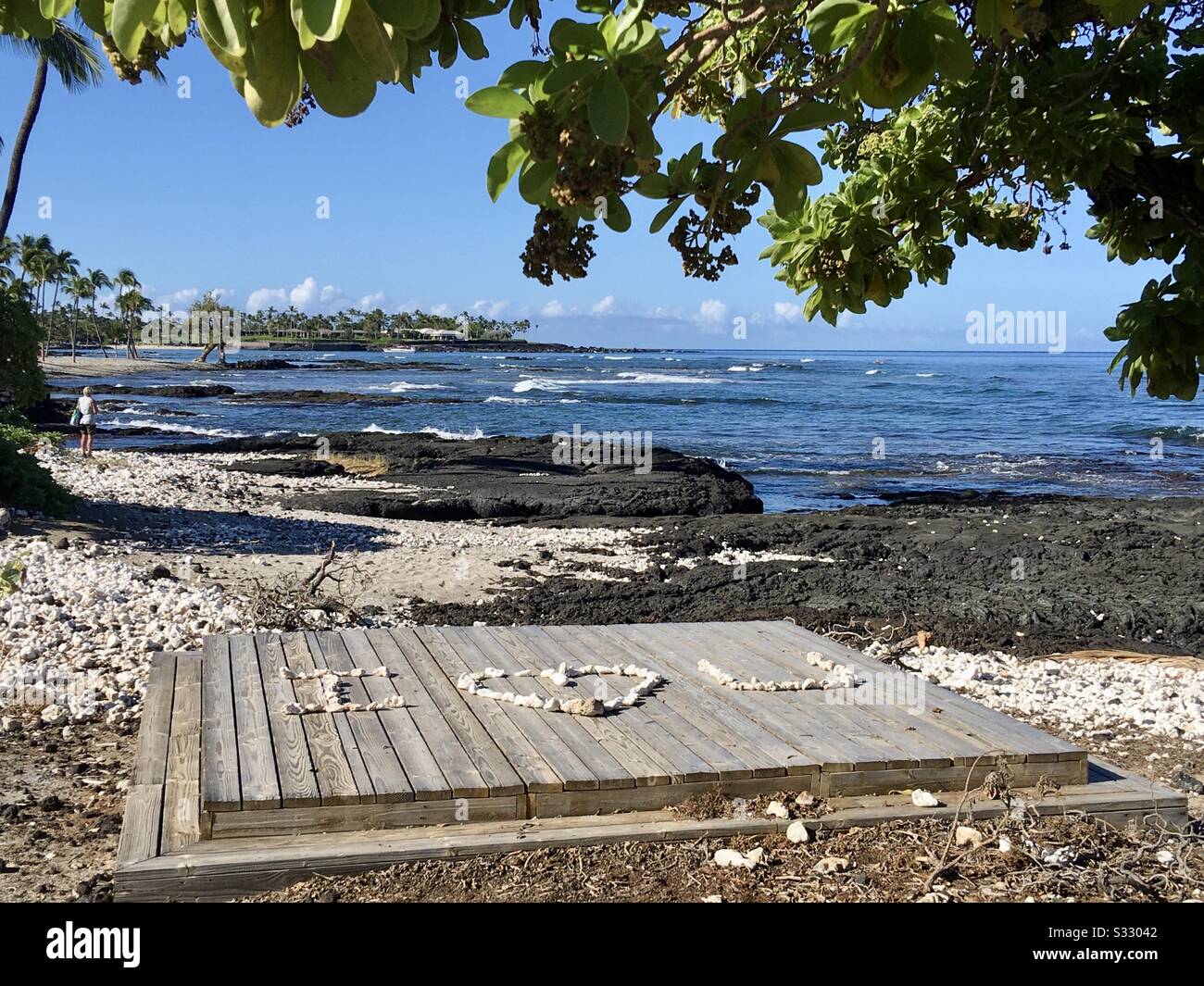 I Love You written with coral beach rocks on a beachside wedding platform at Mauna Lani Resort by Auberge near Puako on the Kohala Coast of the Big Island of Hawaii - Smartphone Captured Stock Image