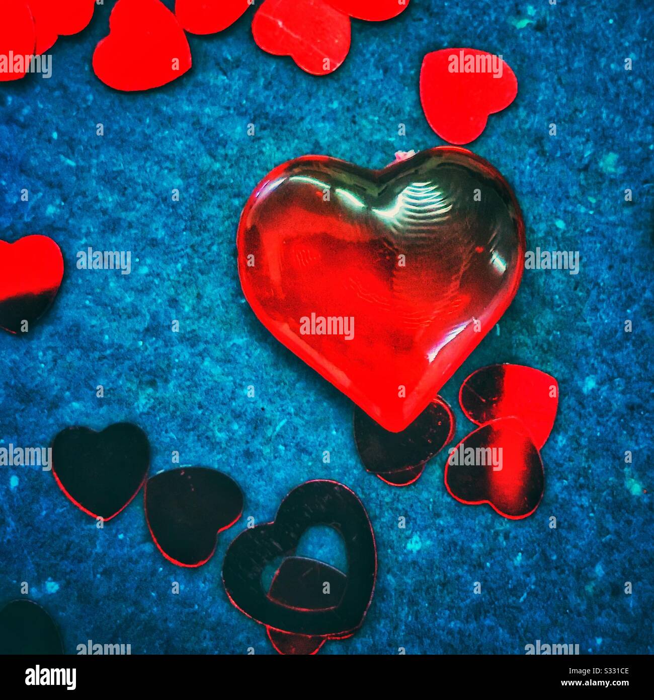 Heart shaped glass beads and sequins. - Smartphone Captured Stock Image