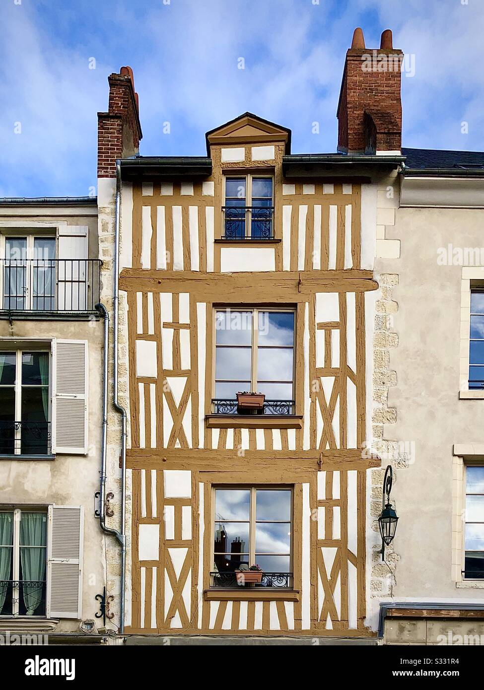 Medieval half-timbered house in the old quarter of Orléans, France. - Smartphone Captured Stock Image