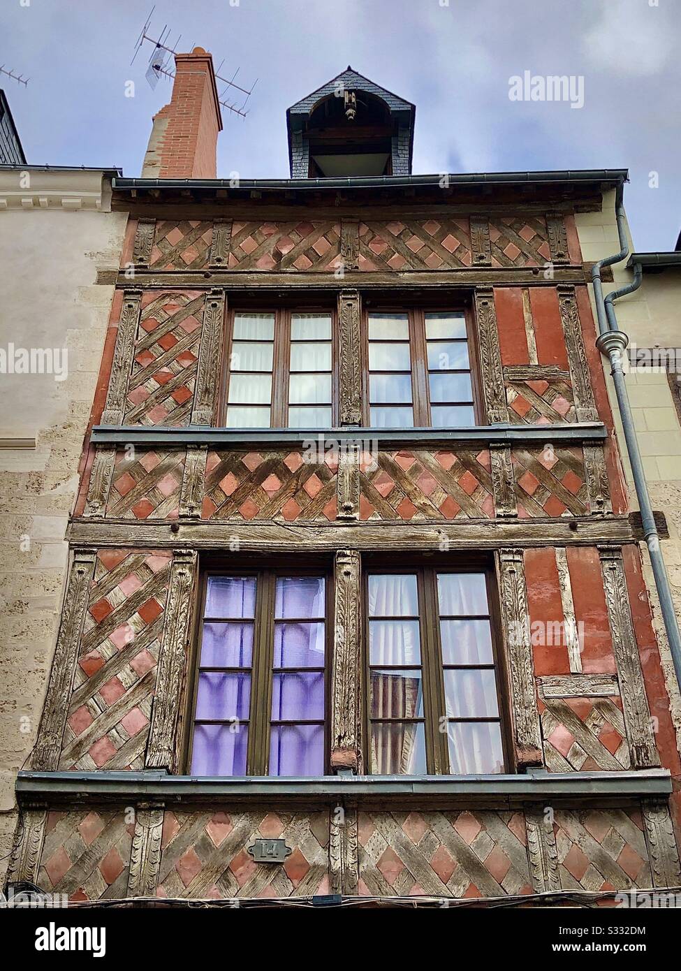 Medieval half-timbered house in the old quarter of Orléans, France. - Smartphone Captured Stock Image