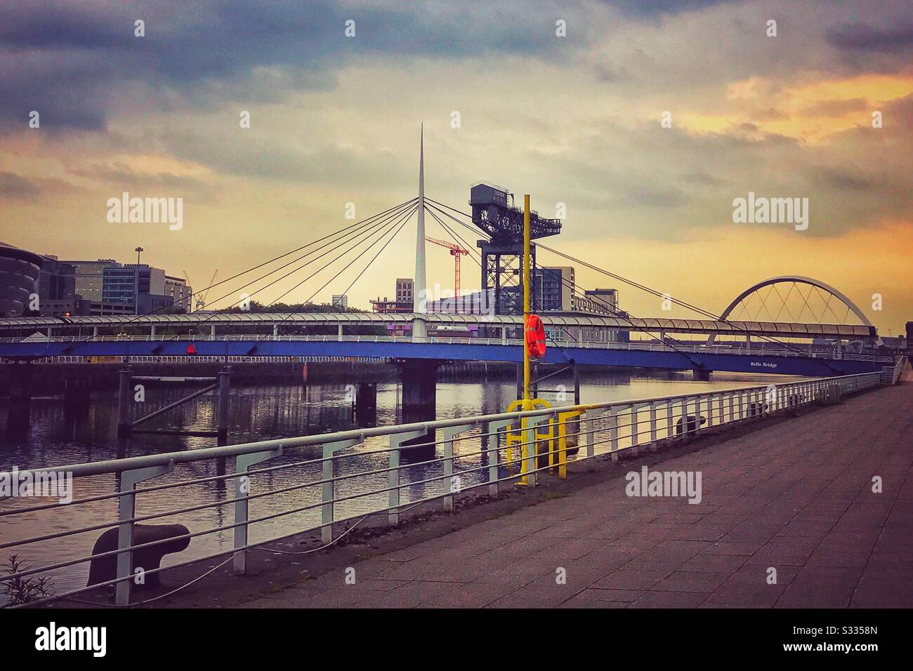 Bells Bridge, Clyde Arc (Squinty Bridge) and Finneston Crane on the River Clyde in Glasgow, Scotland. Stock Photo