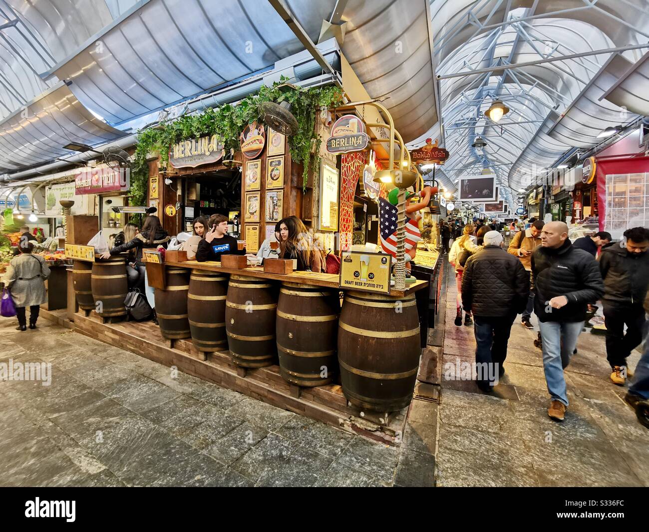 The vibrant Berlina bar at the Mahane Yehuda market in Jerusalem. - Smartphone Captured Stock Image