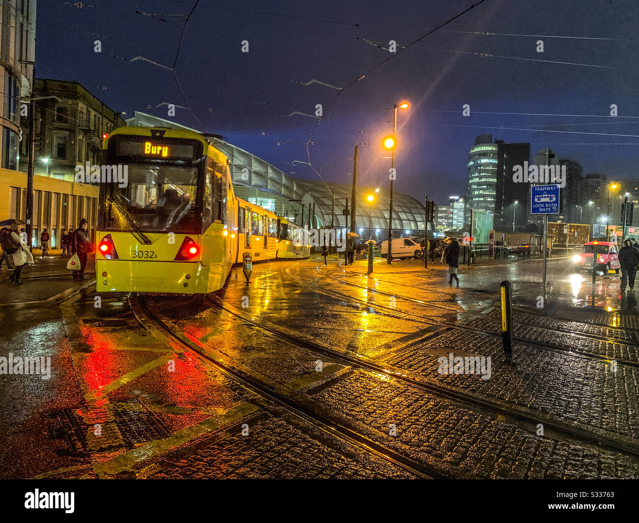 Metrolink tram leaving Victoria train station in Manchester City centre Stock Photo