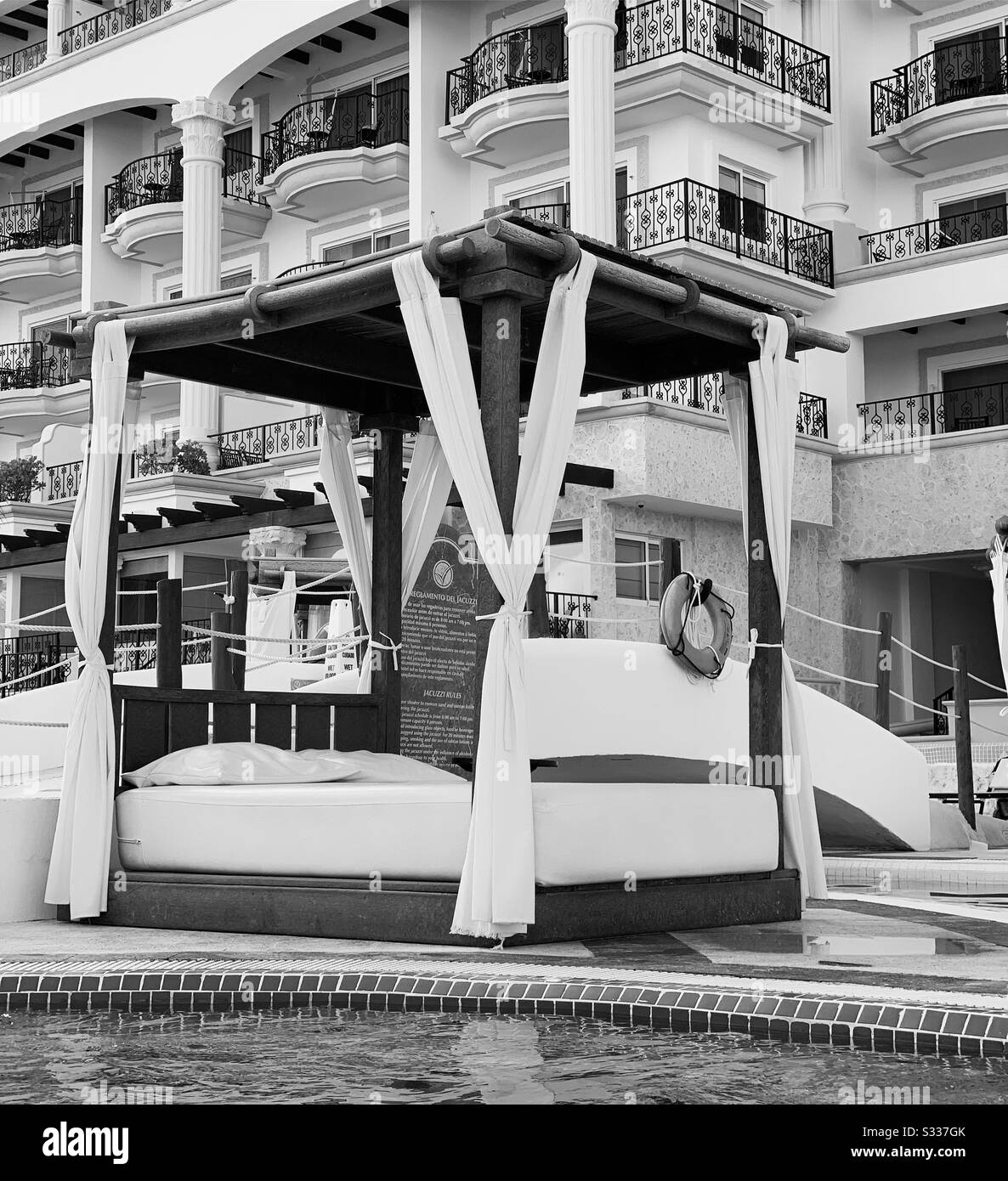 Black and white image of a pool cabana at the Hyatt Zilara, Cancun, Quintana Roo, Mexico - Smartphone Captured Stock Image