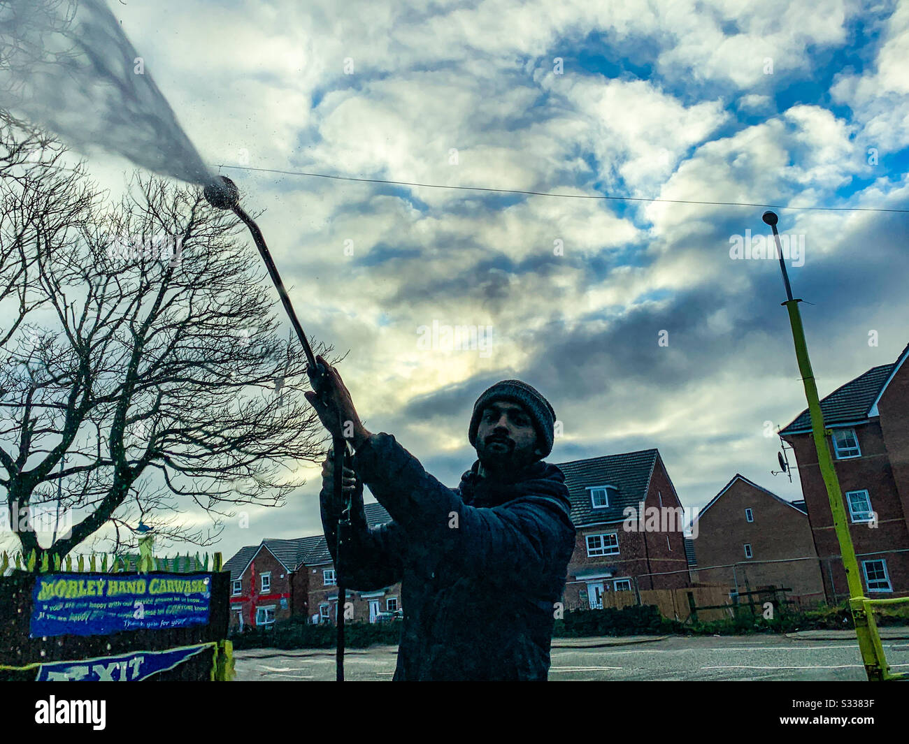 Hand car wash jet spray - Smartphone Captured Stock Image