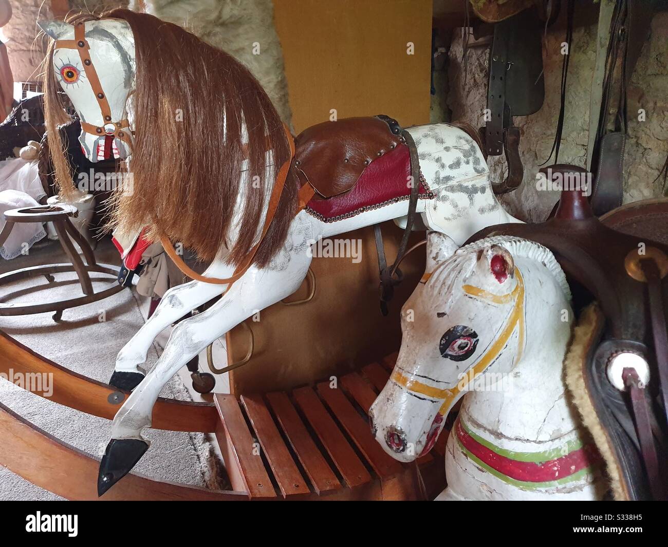 scary doll on rocking horse