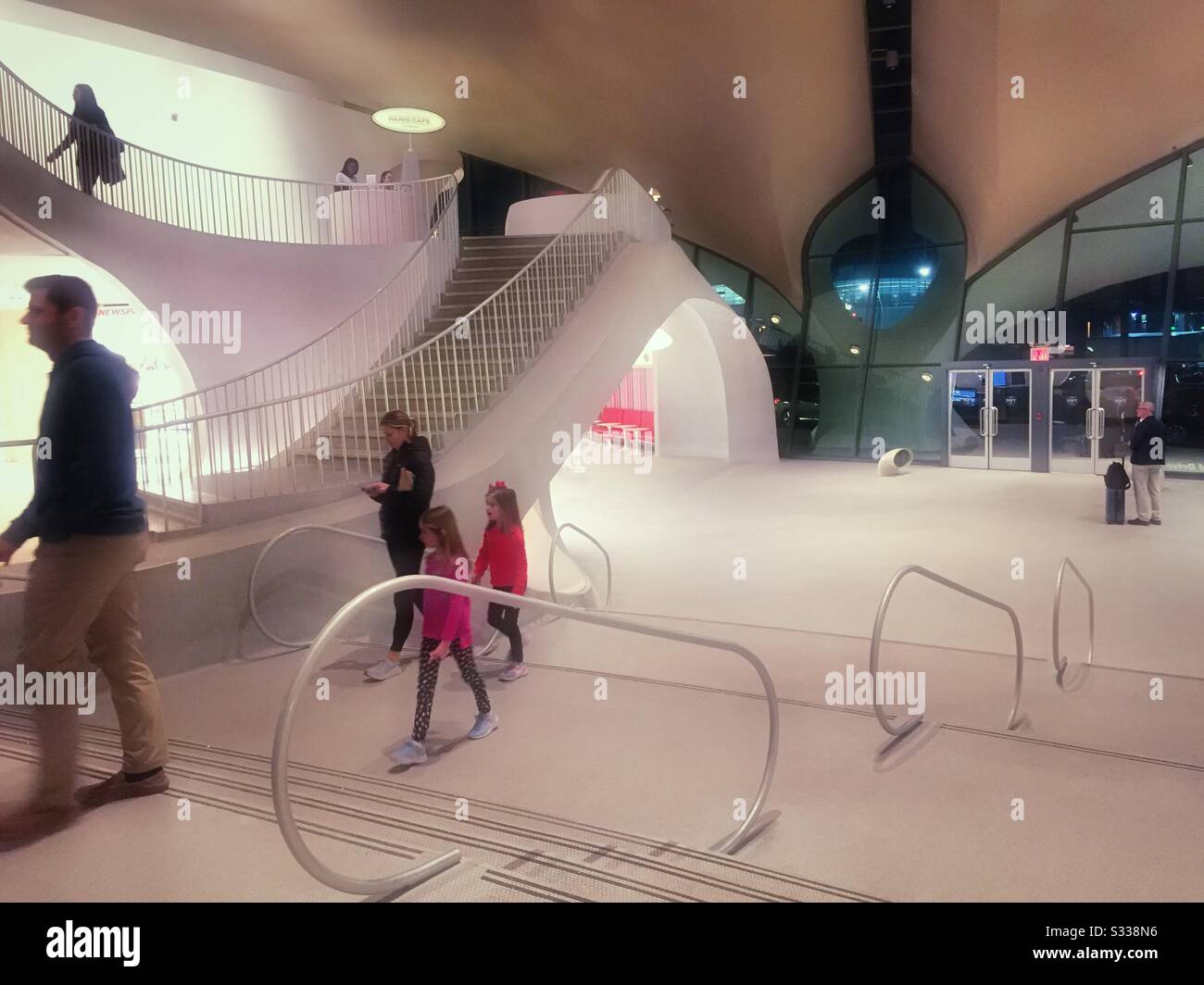 The main lobby of the TWA hotel in terminal four is the restored Transworld airlines terminal, JFK airport, New York City, United States - Smartphone Captured Stock Image