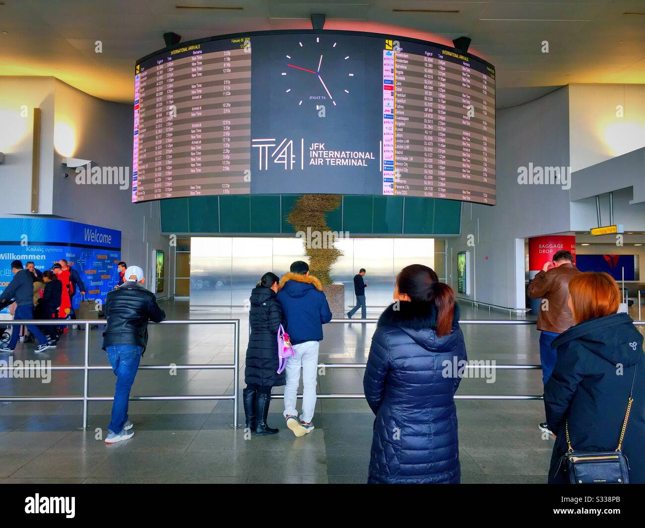 The arrival and departure board in terminal four at JFK airport, NYC