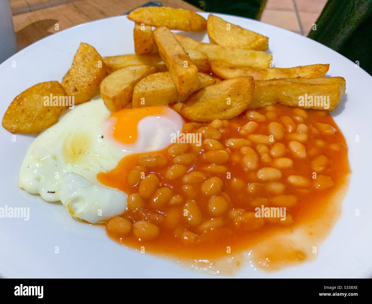Chips egg and beans Stock Photo Alamy