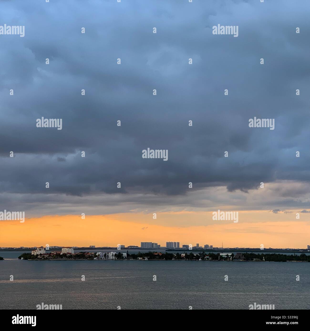 Stormy skies over the lagoon at sunset, Cancun, Quintana Roo, Mexico - Smartphone Captured Stock Image
