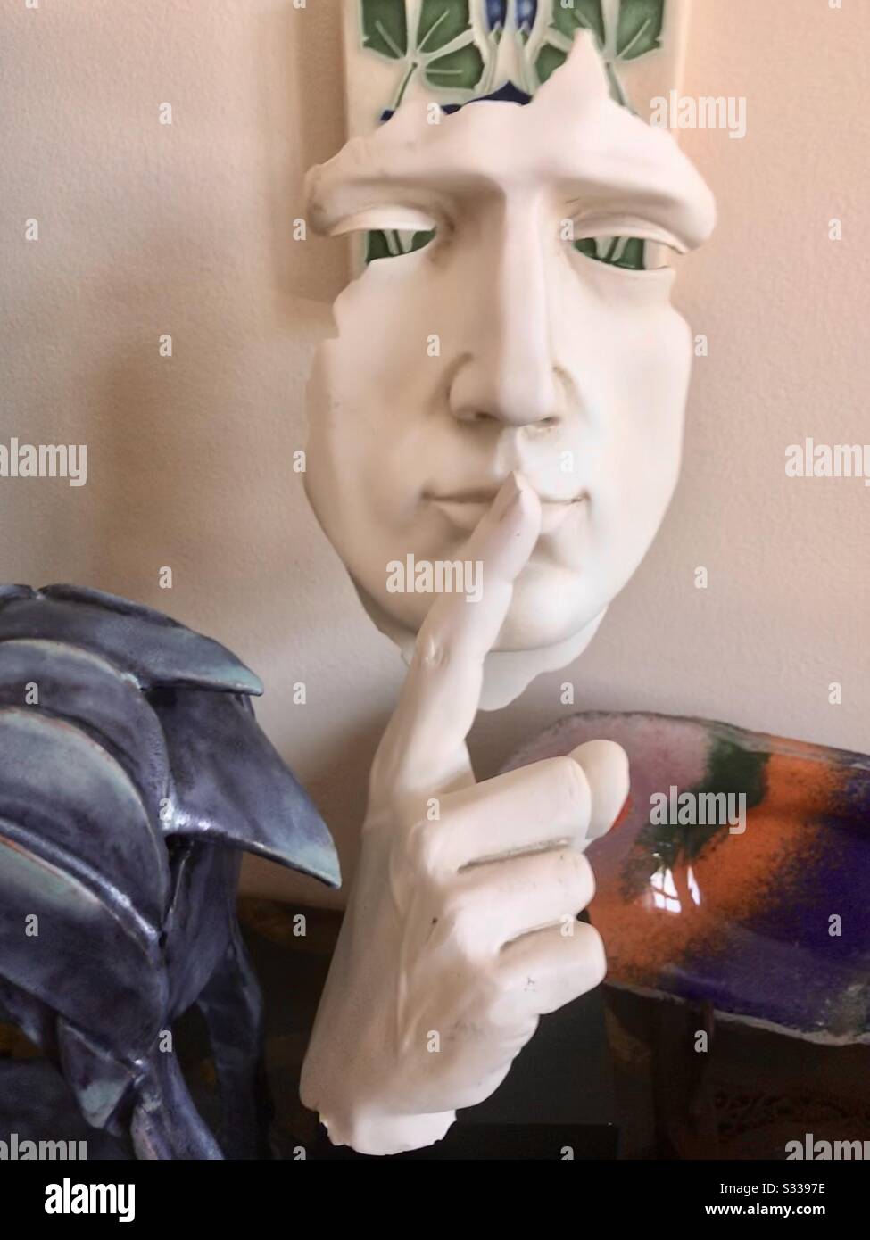 Sculpture array and colorful glass - Smartphone Captured Stock Image