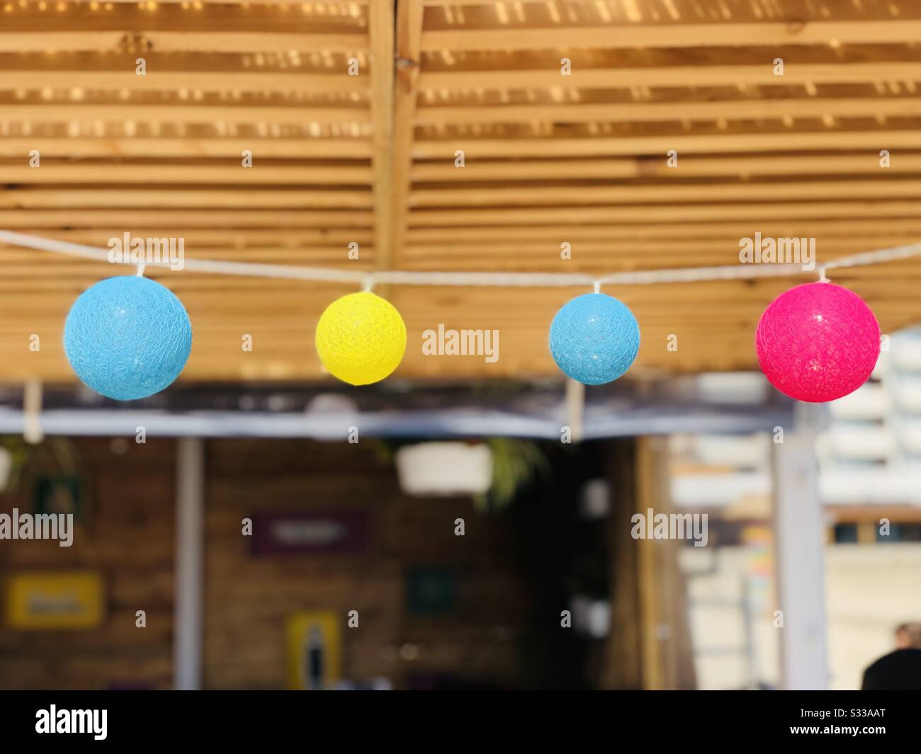 Colorful round decorations on the beach - Smartphone Captured Stock Image