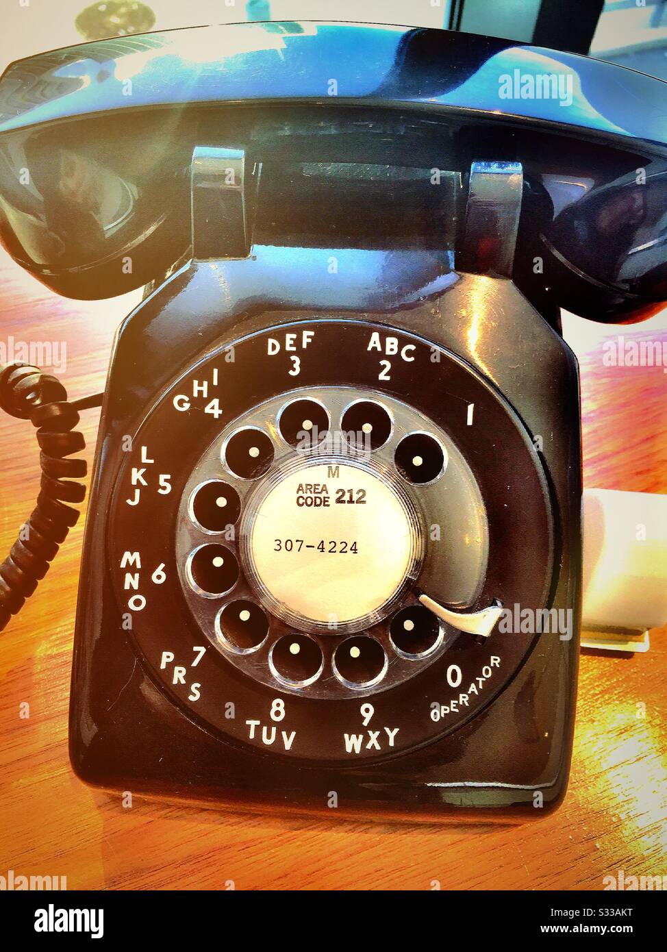 Vintage Rotary dial corded black telephone, 1960s, USA Stock Photo