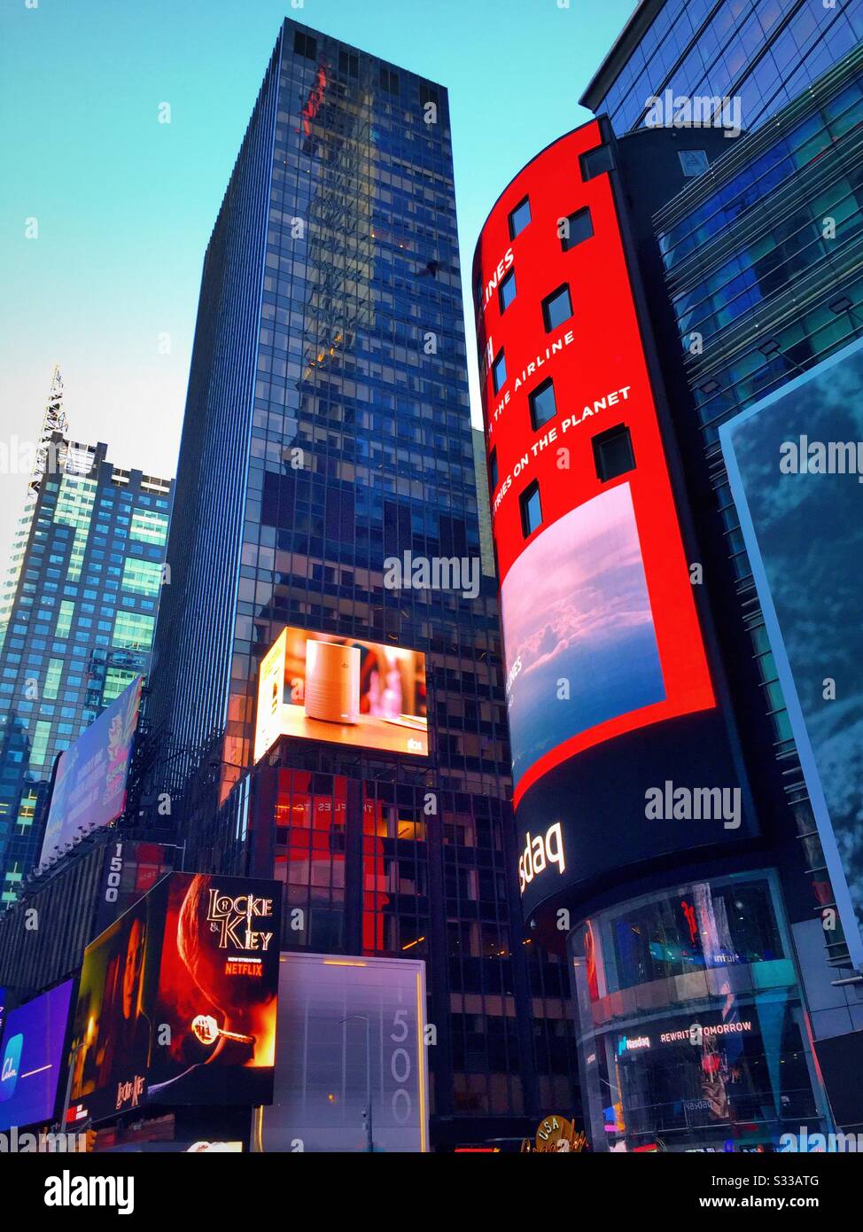 Electronic billboards and the illuminated NASDAQ building shine