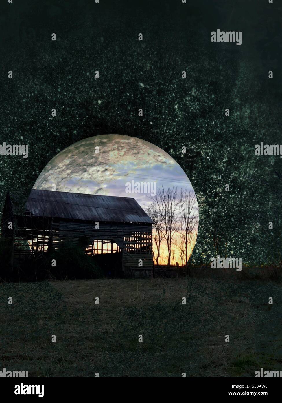Melded photo of old barn at sunset and full moon - Smartphone Captured Stock Image