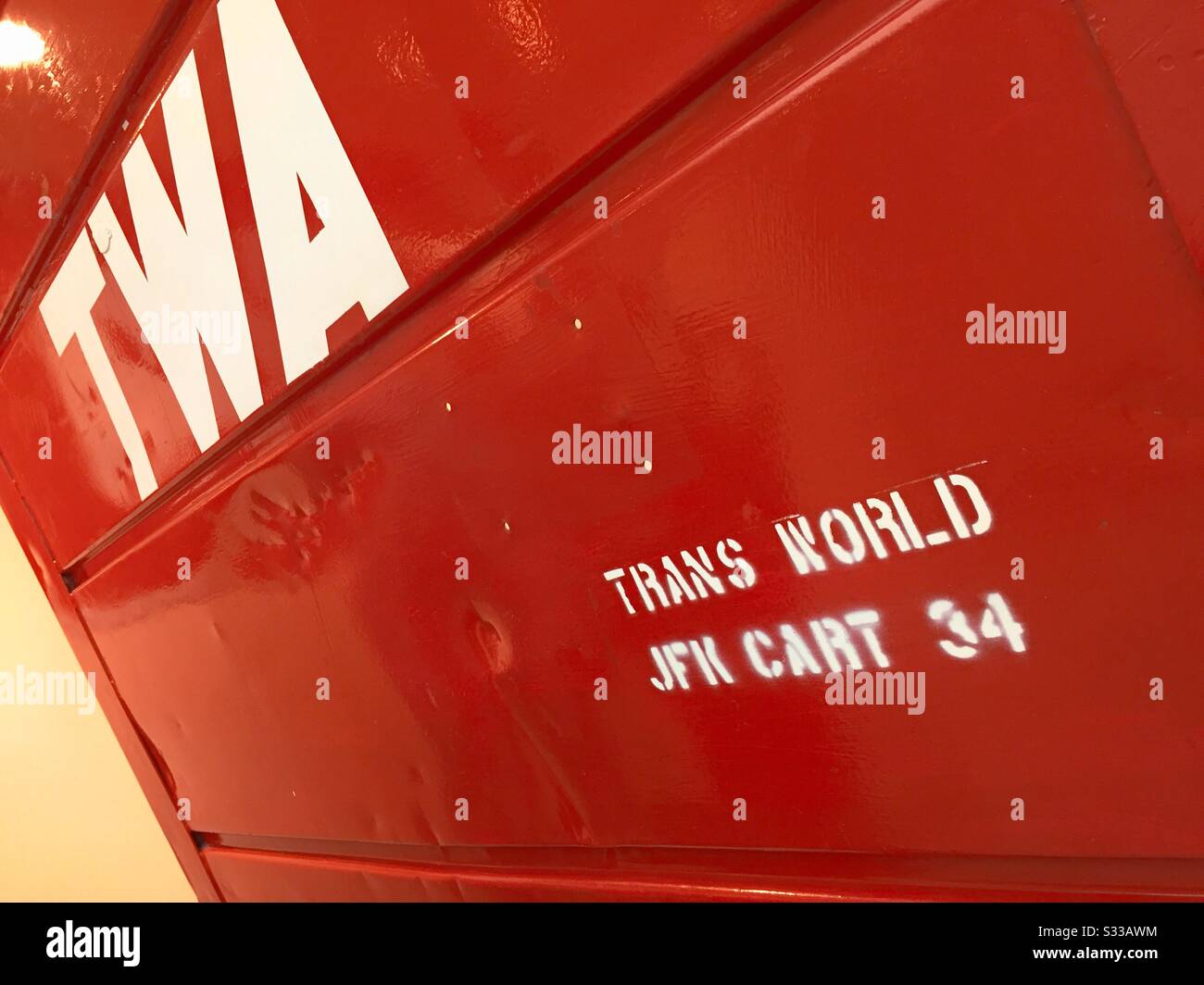 TWA Hotel has displays of the old trans American Airlines luggage carts and it’s restored lobby, JFK airport, NYC, USA - Smartphone Captured Stock Image