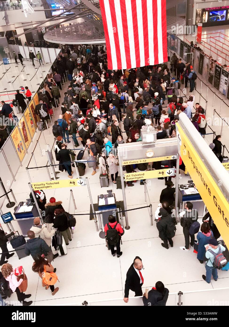 Passengers in TSA lines at terminal one at JFK airport, NYC, USA Stock
