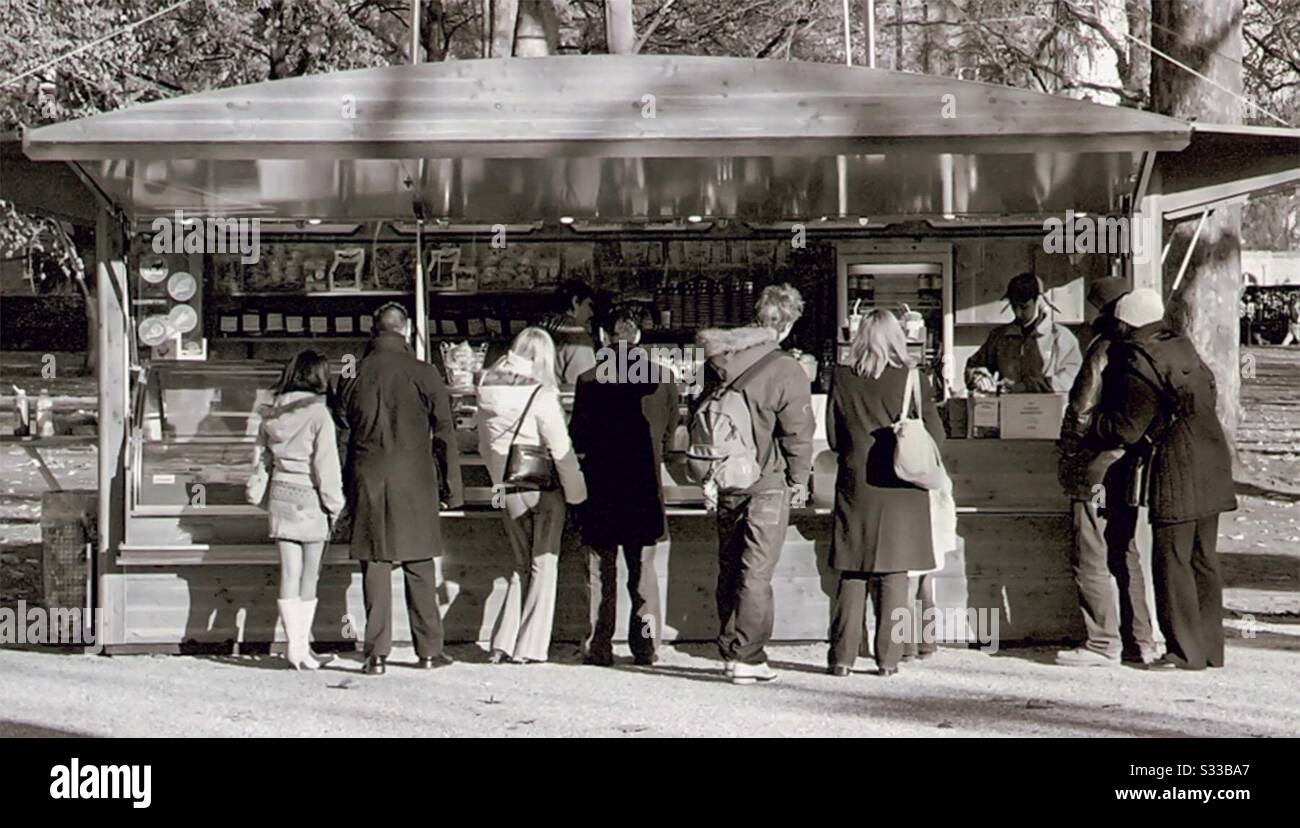 Queuing to eat in Hyde Park, London - Smartphone Captured Stock Image