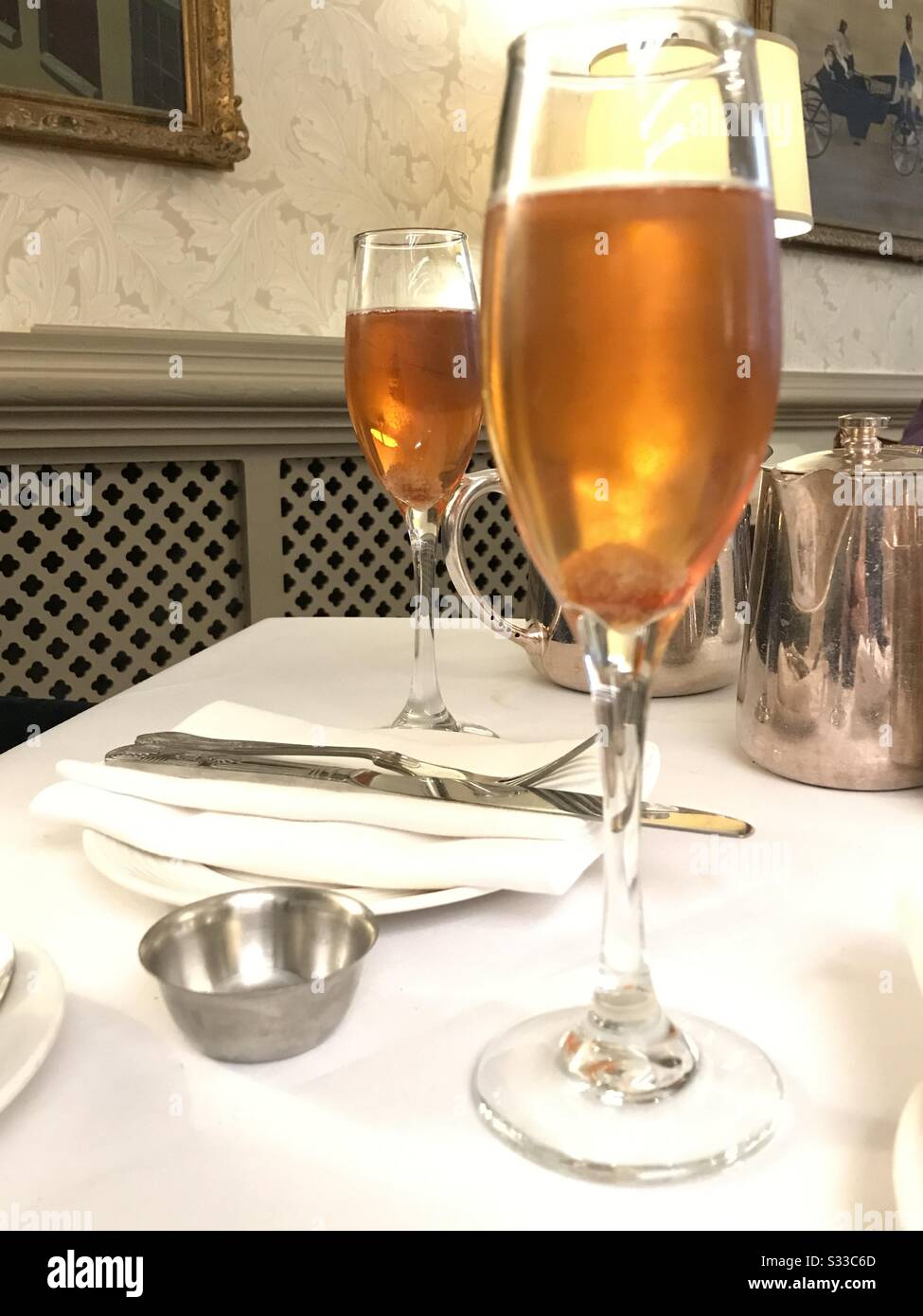 Champagne cocktail before afternoon tea. - Smartphone Captured Stock Image