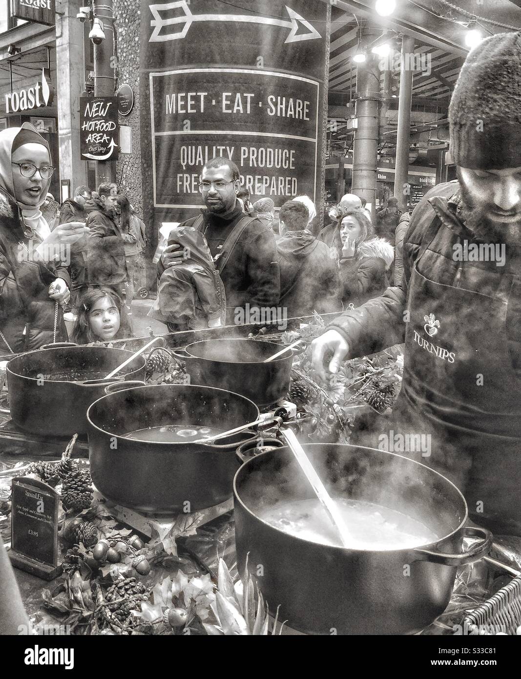 Cooking food.  in Borough Market, London. - Smartphone Captured Stock Image