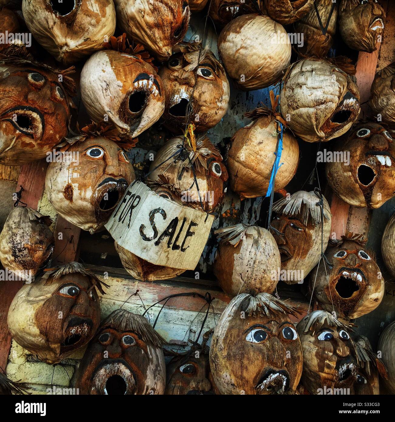 Carved and painted coconut shells for sale in Ubud, Bali, Indonesia - Smartphone Captured Stock Image