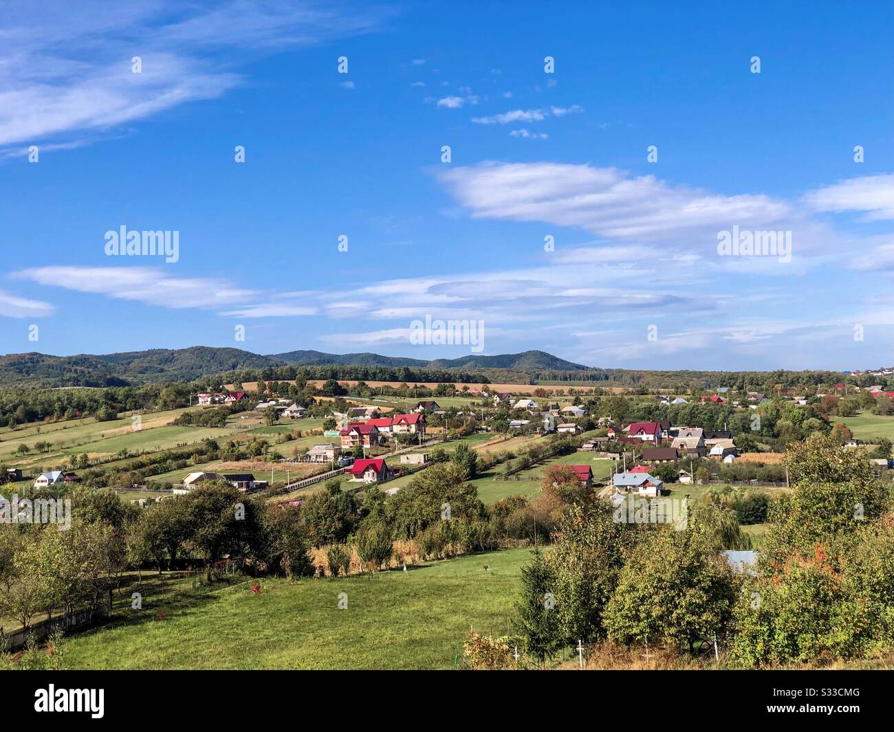 Village in the mountains seen from the distance - Smartphone Captured Stock Image