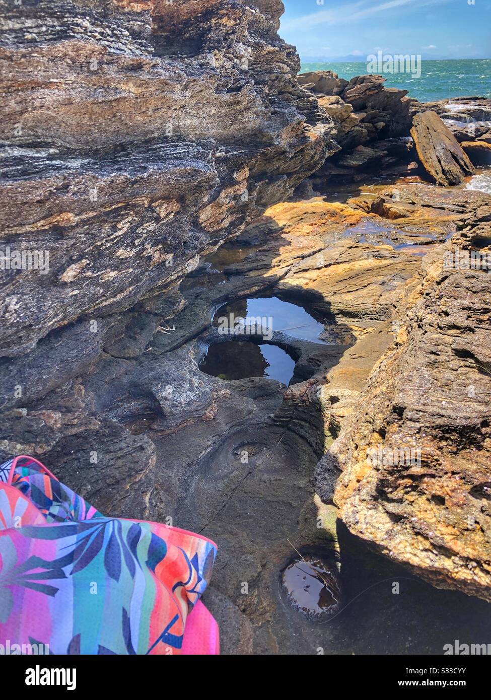 On the rocks in Buzios, Brazil. Stock Photo