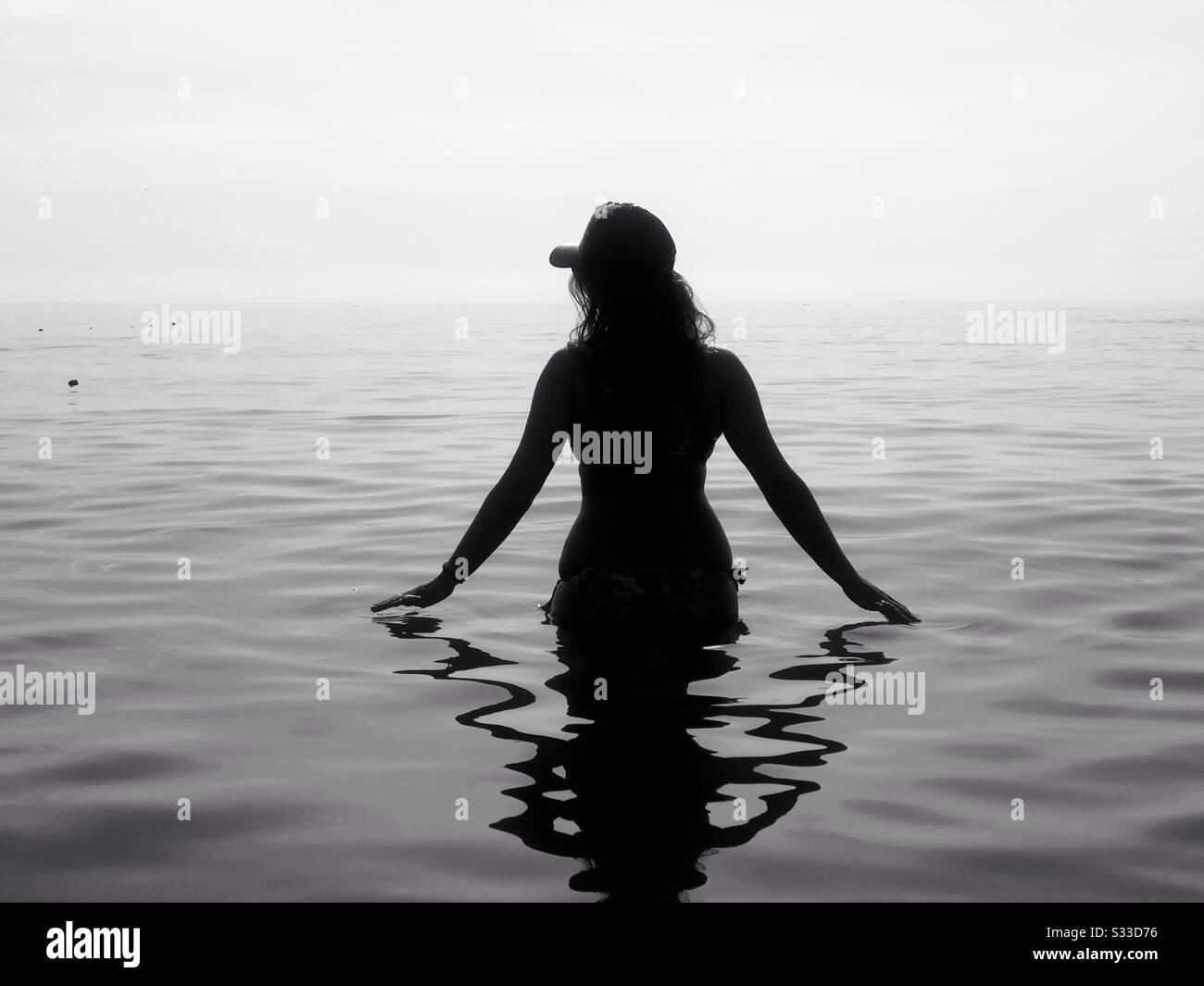 Black and white photo of woman in the water Stock Photo - Alamy