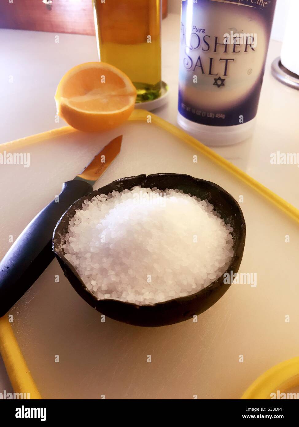 Kosher salt bowl and package still life, USA Stock Photo