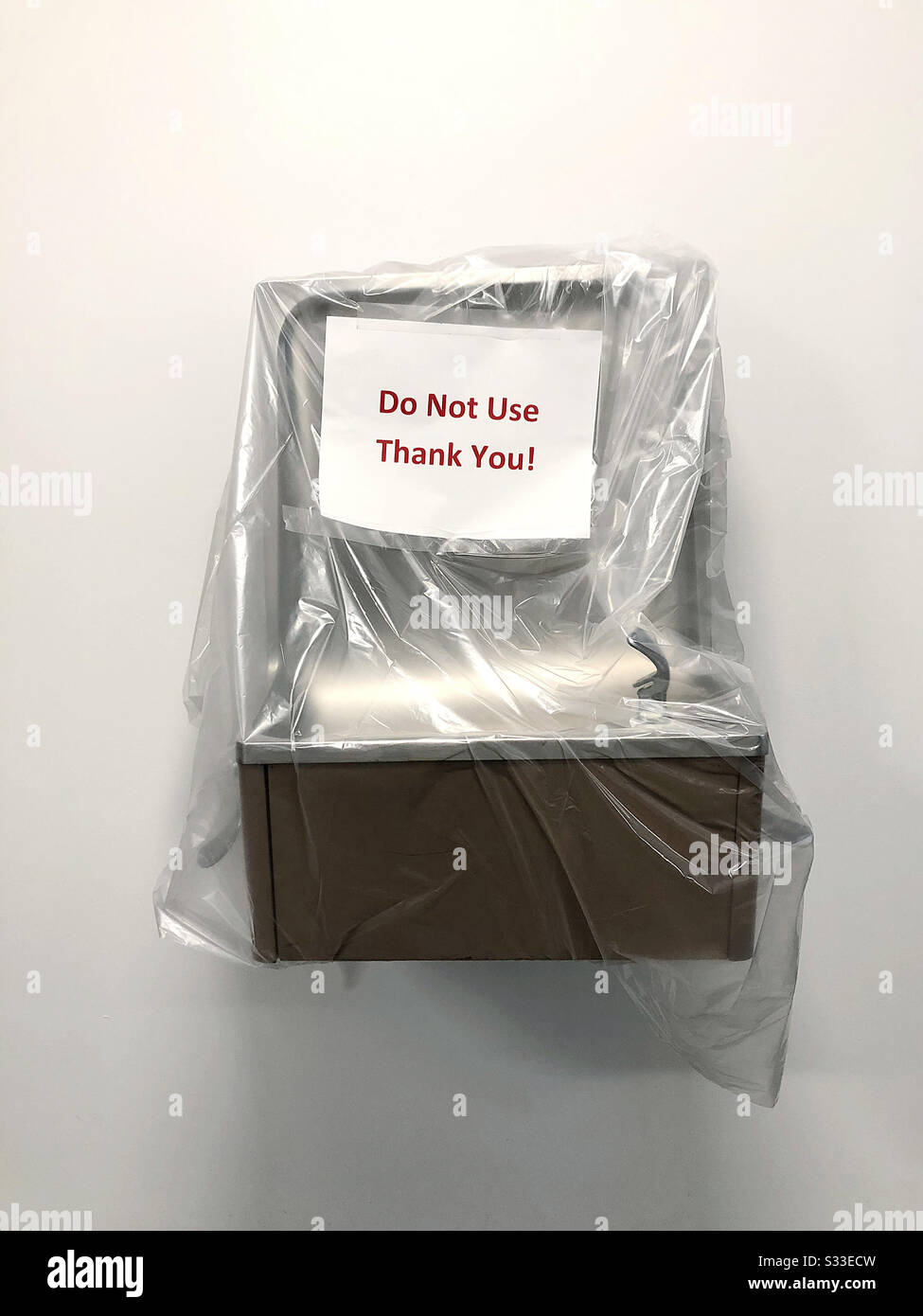 Water fountain shutdown due to temporary water sanitation emergency - Smartphone Captured Stock Image