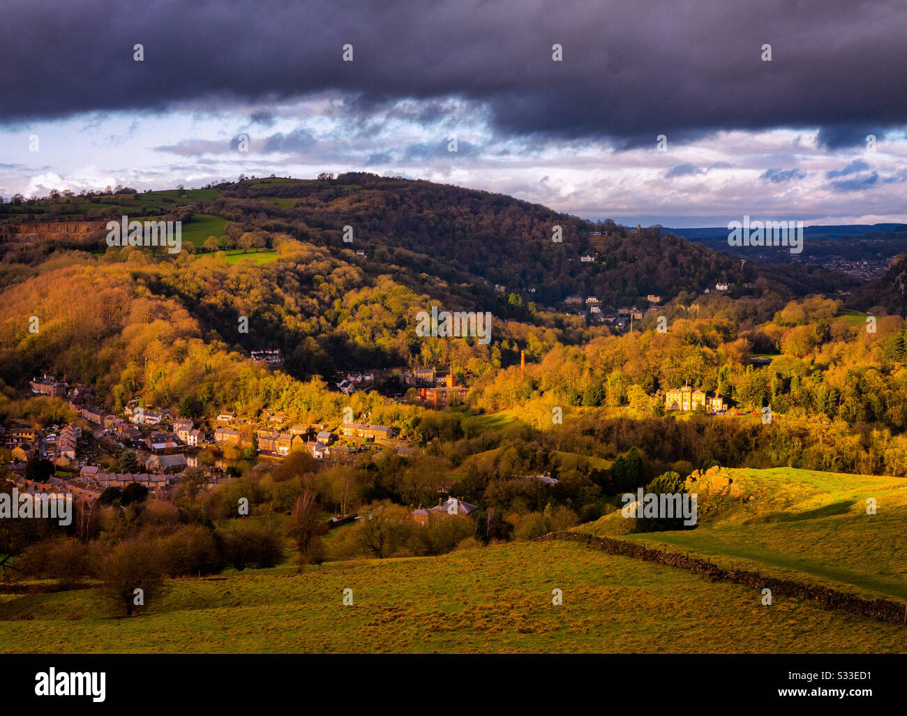View looking towards Cromford and Matlock Bath in the Derbyshire Peak District England UK with stormy sky above. - Smartphone Captured Stock Image