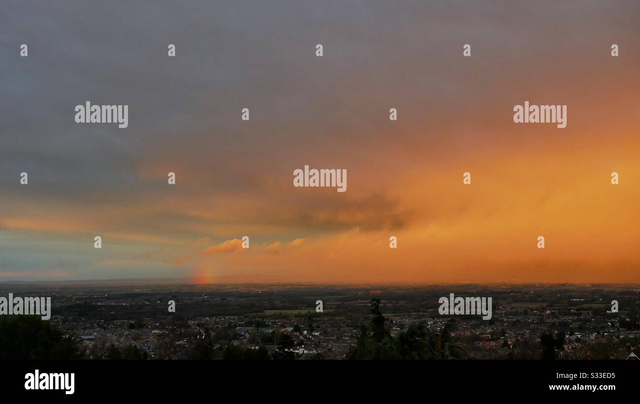 Setting sun shining on stormy sky - Smartphone Captured Stock Image