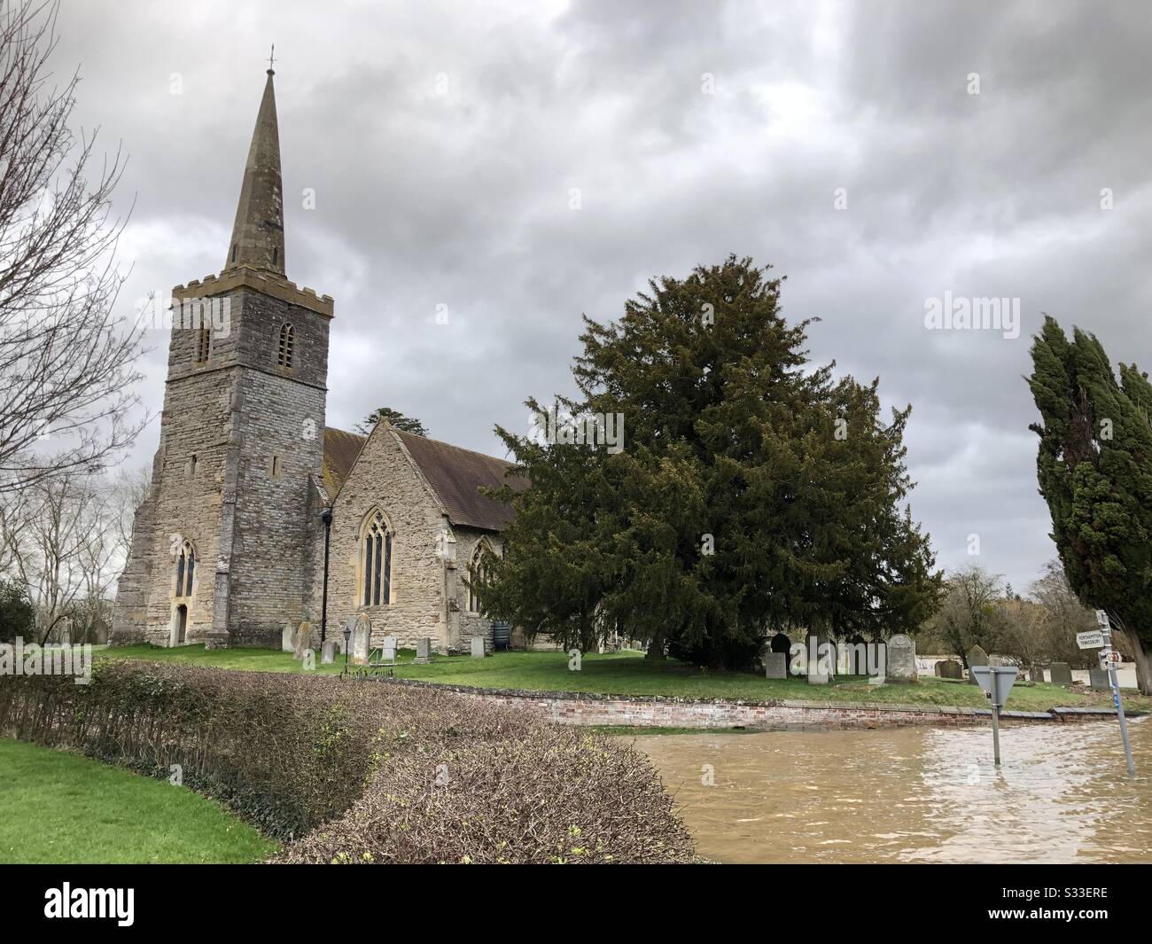 Panoramic view of floodwaters lapping up to Chaceley Church after Storm Dennis during gales. Stock Photo