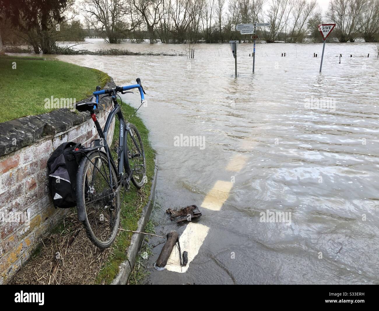Adventure cycling around flooding from Storm Dennis- the road ahead is completely flooded. Stock Photo