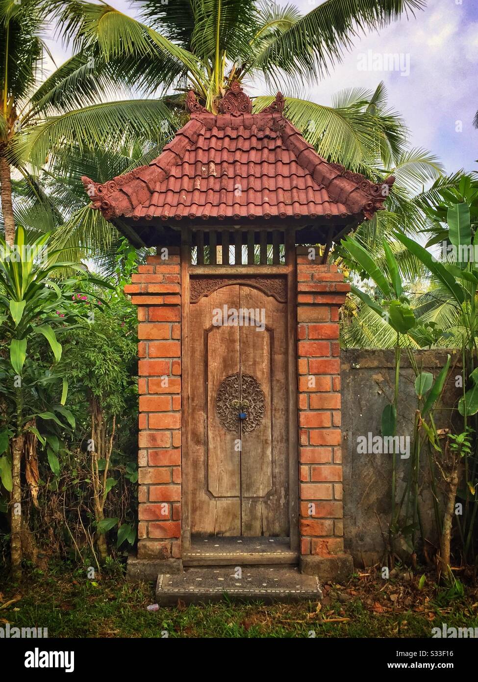 The entrance to a modern house compound near Ubud, Bali, Indonesia - Smartphone Captured Stock Image