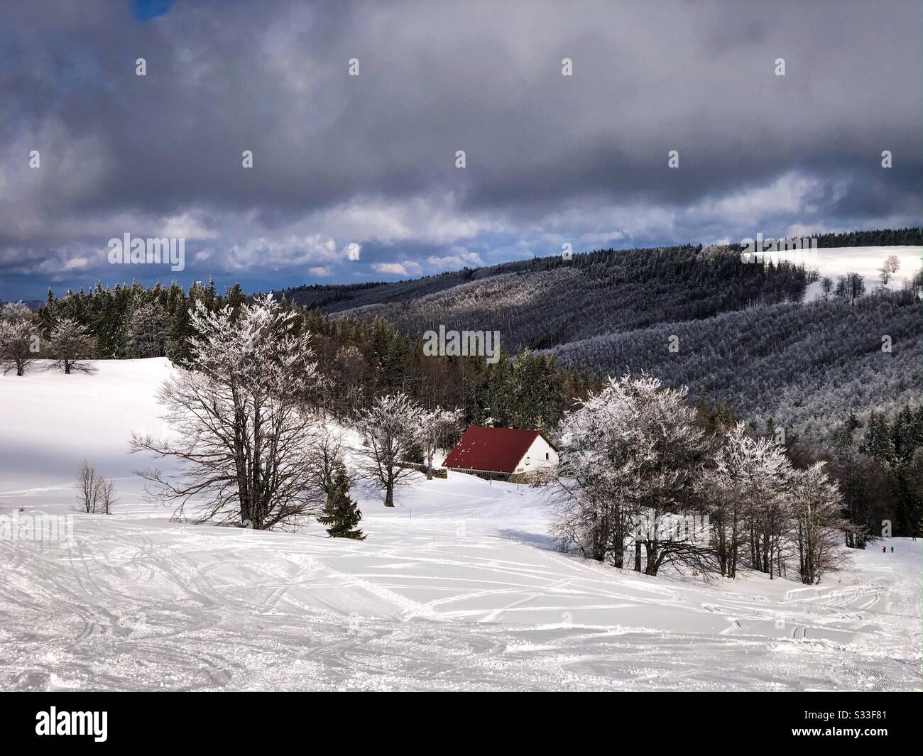 Lonely cabin in the mountains in winter - Smartphone Captured Stock Image