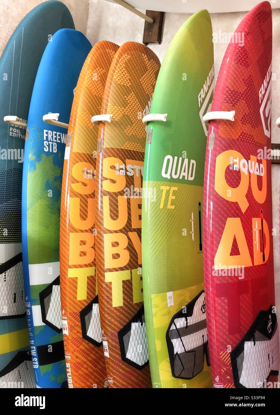 Surfboards lined up in a row Stock Photo Alamy