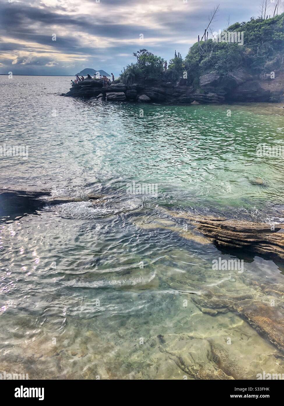 The rugged shoreline at Azeda Beach in Buzios, Brazil. - Smartphone Captured Stock Image