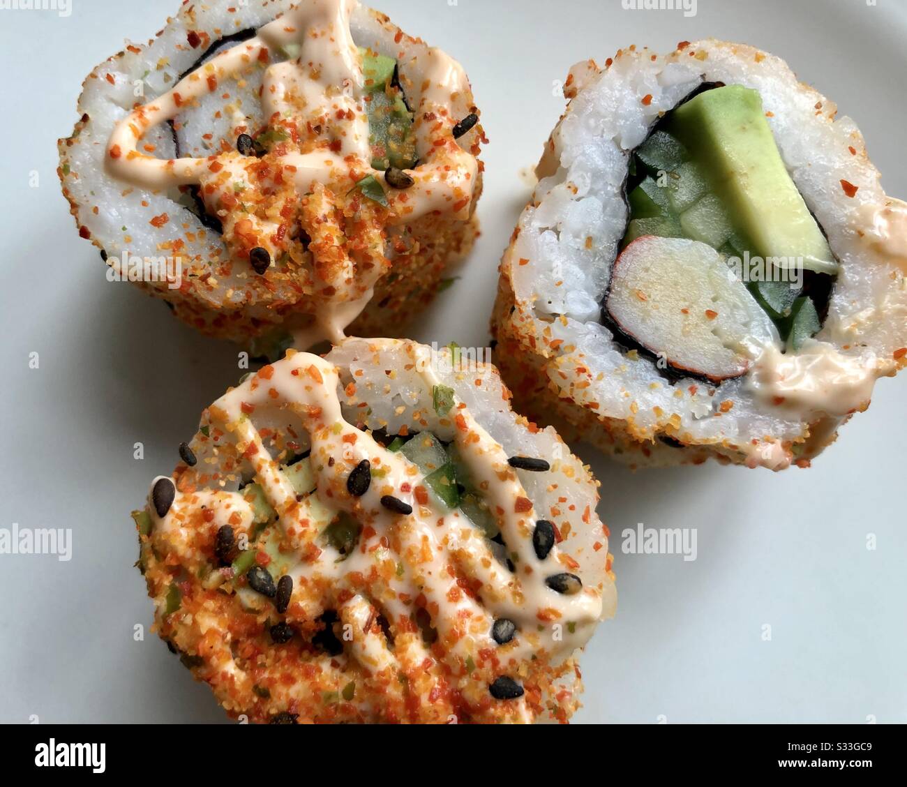 view of sushi on a white plate - Smartphone Captured Stock Image