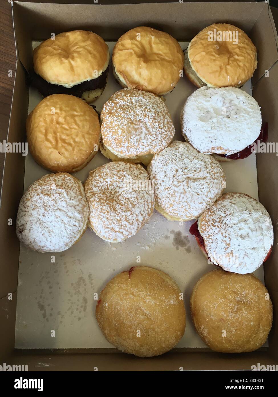 a variety of paczki donuts Stock Photo