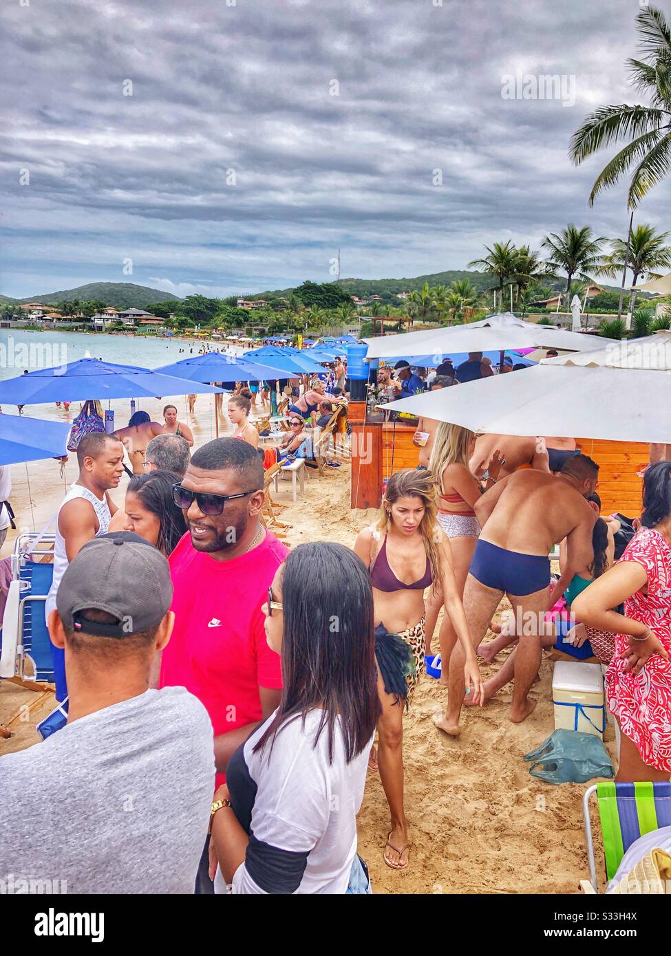 A crowded beach in Buzios, Brazil. Stock Photo