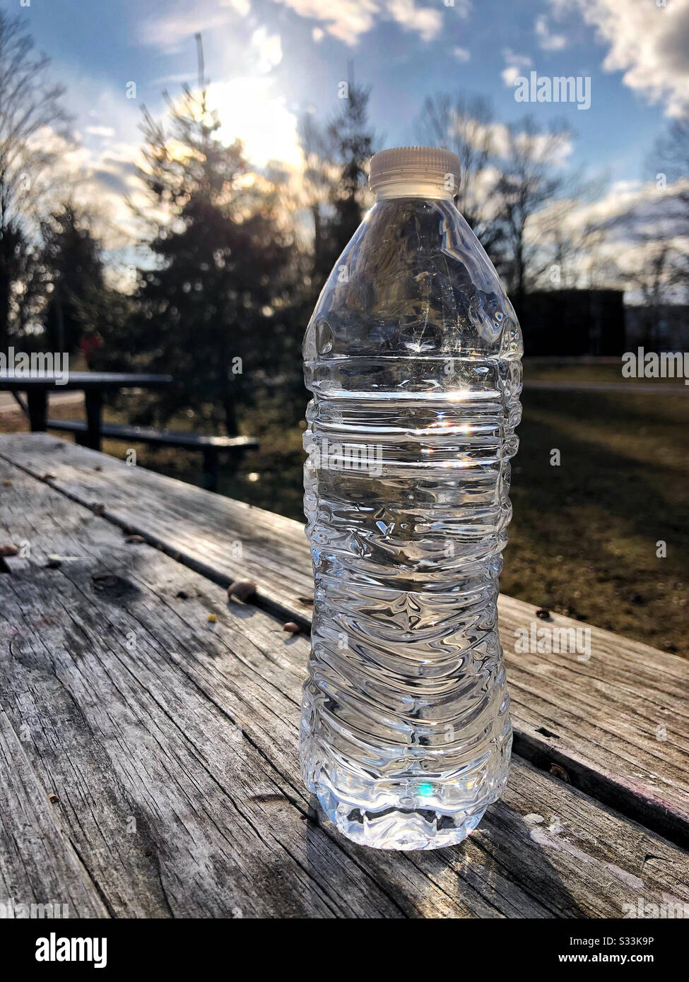 Bottled water outside on a hike Stock Photo