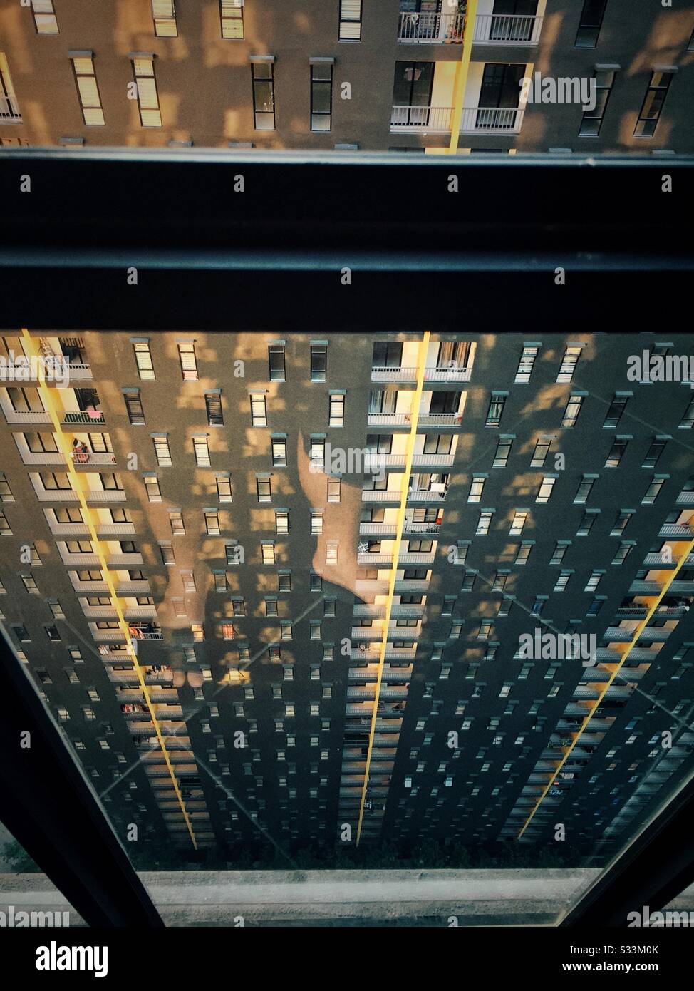 Living at the highest floor condo. - Smartphone Captured Stock Image