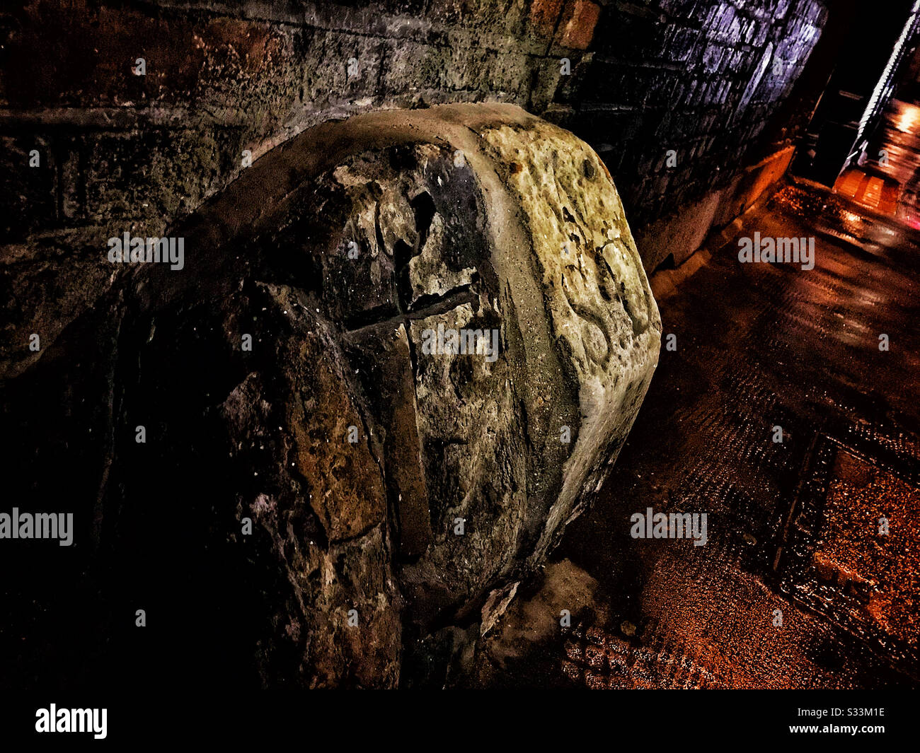 Historic Parish boundary stone on London's Carey Street marking the boundary between St Clements Danes Church and St Dunstan in the West - Smartphone Captured Stock Image