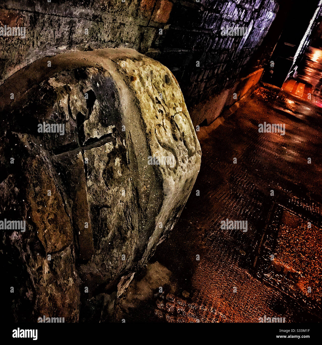 Historic Parish boundary stone on London's Carey Street marking the boundary between St Clements Danes Church and St Dunstan in the West - Smartphone Captured Stock Image
